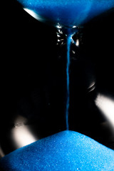 blue retro hourglass to measure time