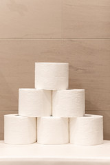 stack of white toilet paper rolls