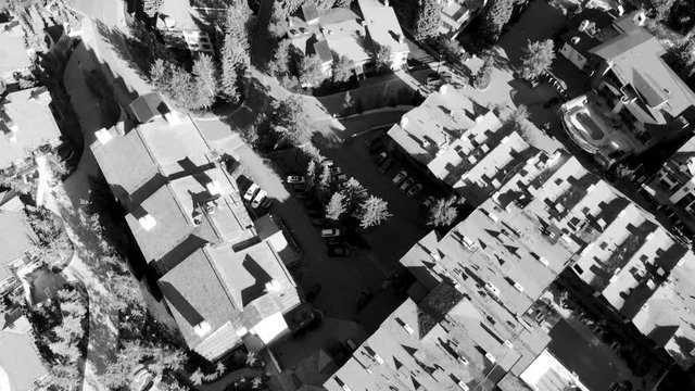 Buildings in Vail, Colorado. Aerial view on a beautiful summer morning, revealing city landscape in black and white
