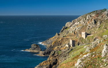 Fototapeta na wymiar Crowns Engine Houses at Botallack - Tin mine in Cornwall England. Film location for TV period drama Poldark. Botallack village lies between the town of St Just in Penwith and the village of Pendeen.