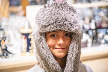 Young girl wearing iceland hat with fur