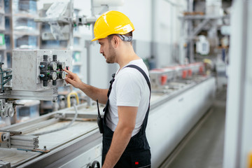 Portrait of man working in factory	