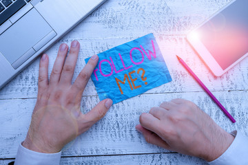 Writing note showing Follow Me Question. Business concept for go or come after demonstrating or...