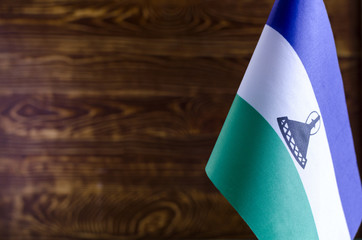 Flags of African countries Fragment of the flag of Lesotho in the foreground space for text blurred...