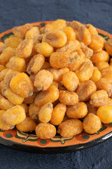 Toasted and seasoned maize or corn nuts