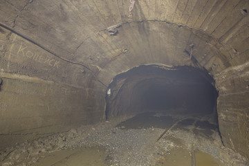 Gold iron mine ore shaft tunnel drift with fog