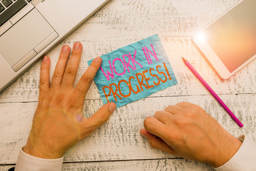 Writing note showing Work In Progress. Business concept for unfinished project that still added to...