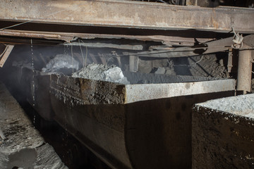 Gold iron mine shaft loading ore to car wagon