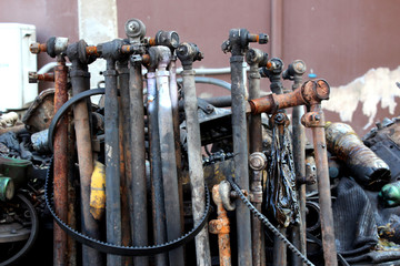 A pile of rusty old car parts