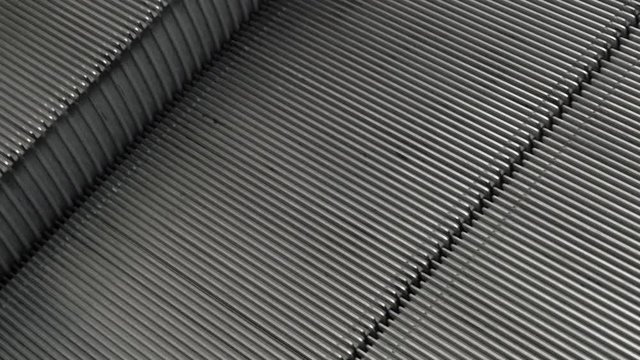 Close up of empty steps of pedestrian escalator in a shopping mall