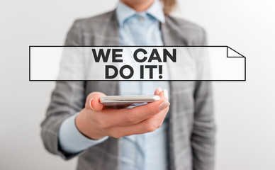 Handwriting text We Can Do It. Conceptual photo see yourself as powerful capable demonstrating Business concept with mobile phone and business woman