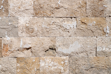   beige natural stone wall for background