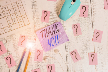 Writing note showing Thank You. Business concept for a polite expression used when acknowledging a...