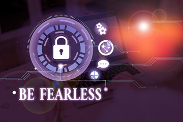 Conceptual hand writing showing Be Fearless. Concept meaning act of living in spite of those things...