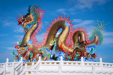 Fototapeta na wymiar Chinese Happy New Year. Chinese dragon decoration on festive blue sky background.