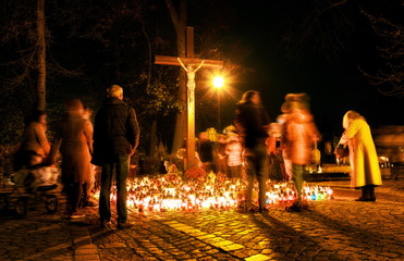 People in cemetery at All saints Day