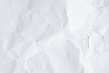 Abstract white crumpled paper texture background