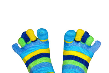 Legs in funny striped socks with fingers isolated on white background