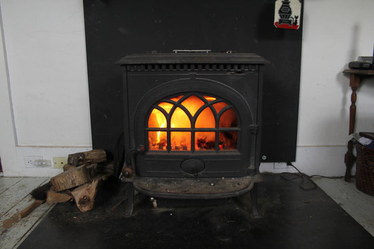 fire in the wood stove fireplace