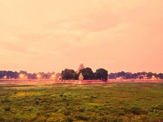 sunset over olden architecture 