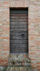 the ancient wooden door is closed
