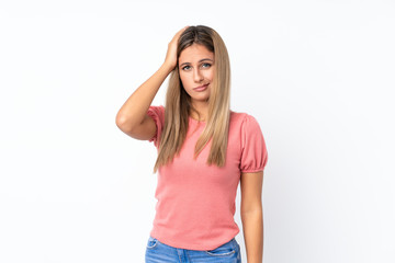 Young blonde woman over isolated white background with an expression of frustration and not understanding