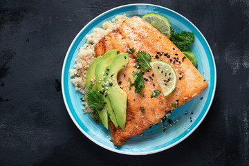 Grilled salmon with avocado, quinoa and sesame