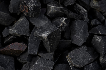 Crushed gravel texture background, background made of a closeup of a pile of crushed stone, pile of pebbles, Gravel stone background or texture, stones rubble and gravel.