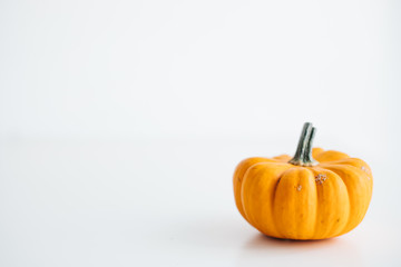 Fresh pumpkin isolated on white background. For Halloween, thanksgiving holiday and Autumn theme.