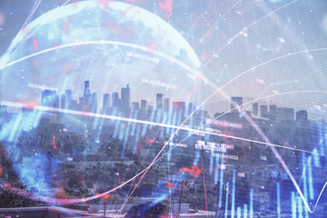 Obraz premium Forex chart on cityscape with skyscrapers wallpaper multi exposure. Financial research concept.