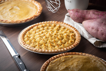 sweet potato pie on wooden background