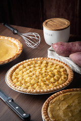 sweet potato pie on wooden background