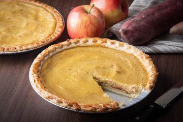 sweet potato pie on wooden background