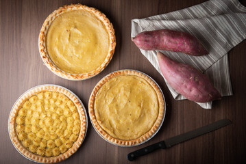 sweet potato pie on wooden background