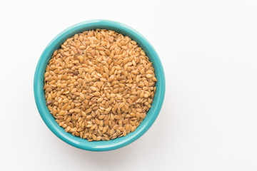 Whole Gold Flaxseeds in a Bowl