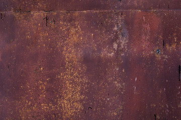 Orange rust corrosion sheet metal. Old textured piece of iron for background.