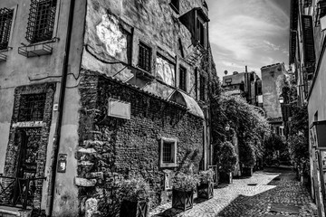 Picturesque alley in Trastevere in black and white