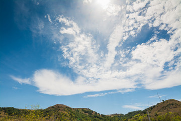 Cloudy sky over a small hill in Sardinia