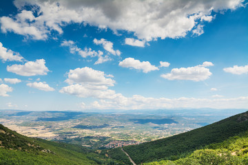 Obraz premium Clouds over a green valley in Sardinia