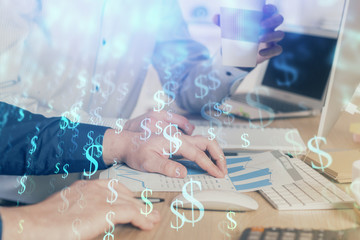 Multi exposure of chart with man typing on computer in office on background. Concept of hard work.