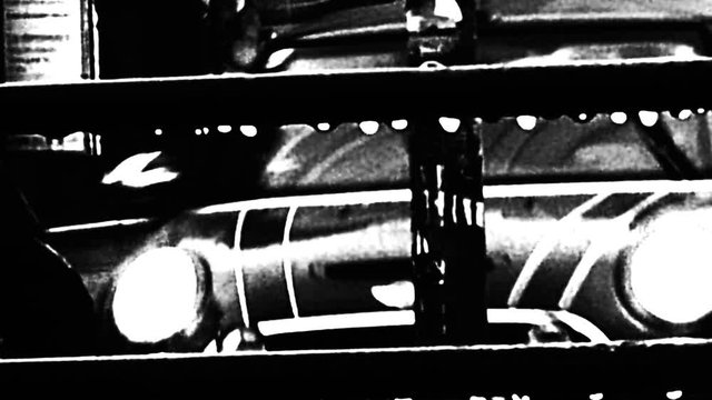 Daylight urban motion time lapse. Dynamic stressful city life. Shaky noisy visuals of cars movement. High contrast silhouettes - abstract decoration background. Real fast speed routine.