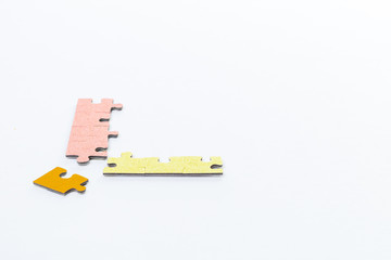 an angle of puzzles showing an idea of teamwork and mergence