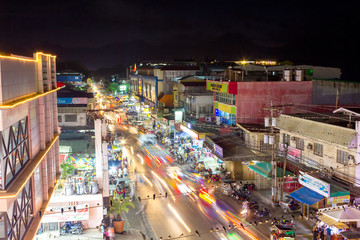 Busy night street in Puerto Princesa, Palawan, Philippines - April 2018.