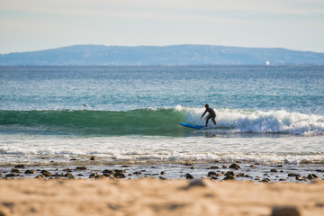Fototapeta na wymiar Surfers