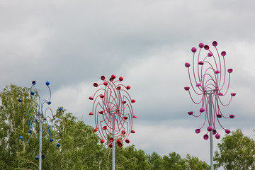 Meterological weather station wind meter anemometer on sky background. Big and colorful scientific...