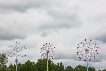 Meterological weather station wind meter anemometer on sky background. Big and colorful scientific...