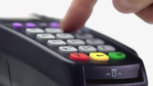 Credit card payment terminal, swiping for sale transaction. Close-up view.