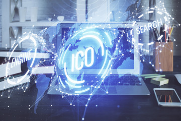 Multi exposure of blockchain theme hologram and table with computer background. Concept of bitcoin crypto currency.