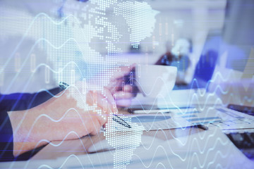 Double exposure hands with stock market chart.