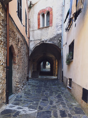 Fototapeta na wymiar narrow street in old town of Italy